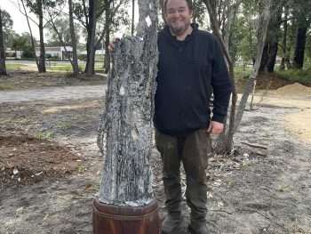 Paul Fontanini near his sculpture - installation day, Understory Garden gallery, June 2025